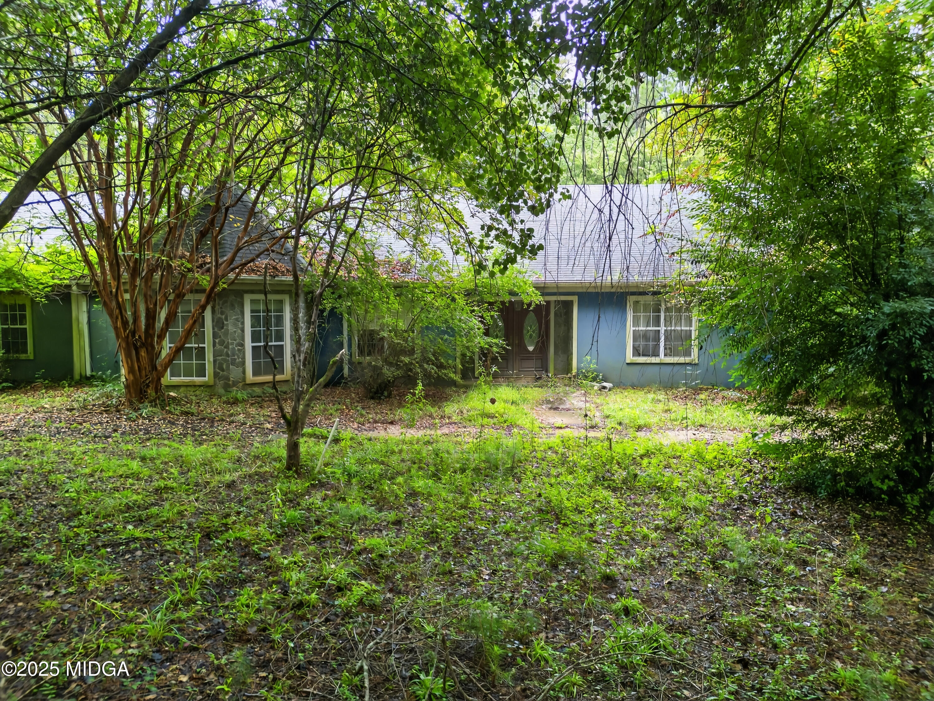 615 Lite-N-Tie Road Gray, GA 31032 - Photo 18 of 19 a house view with a garden space