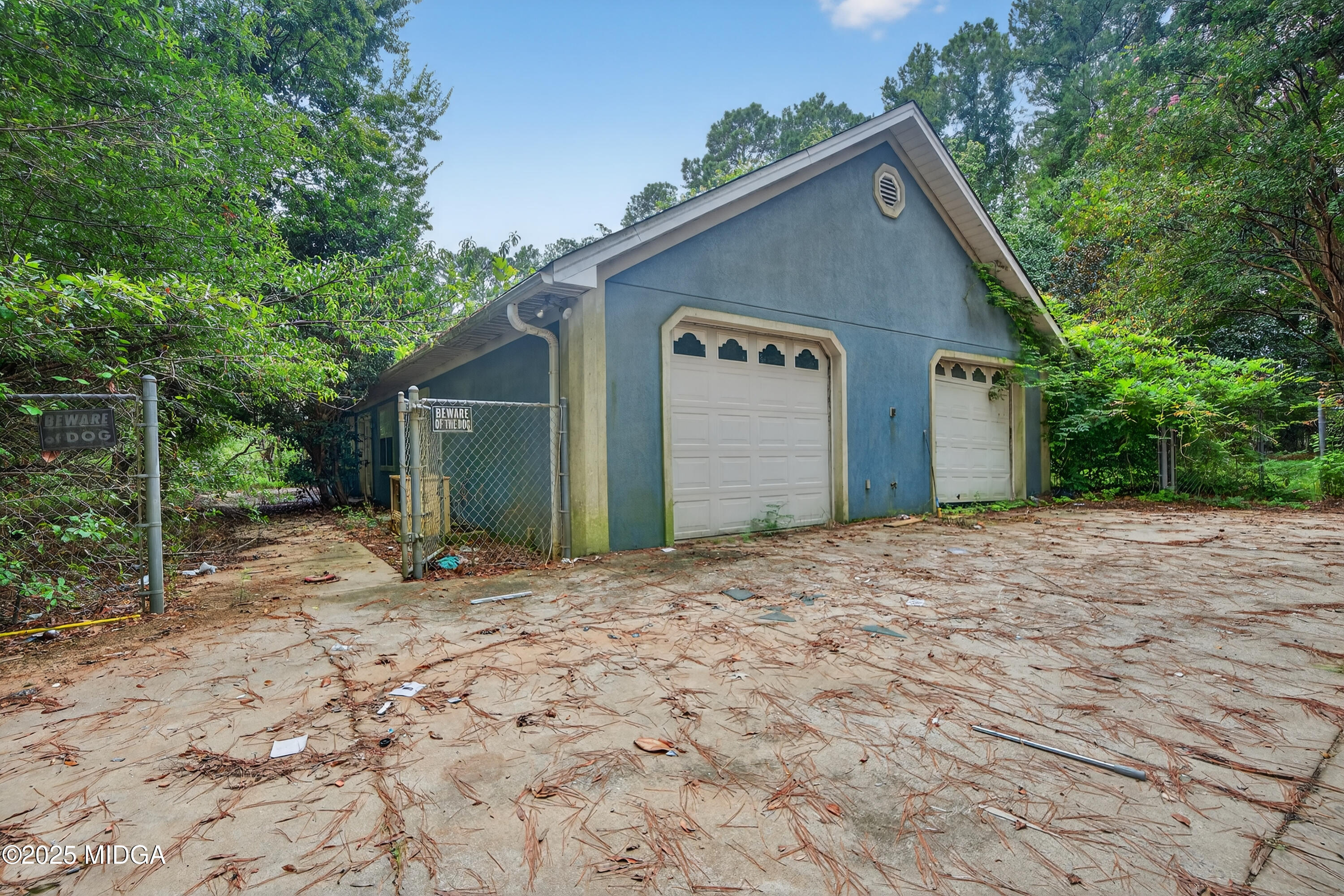 615 Lite-N-Tie Road Gray, GA 31032 - Photo 2 of 19 a front view of a house with a yard