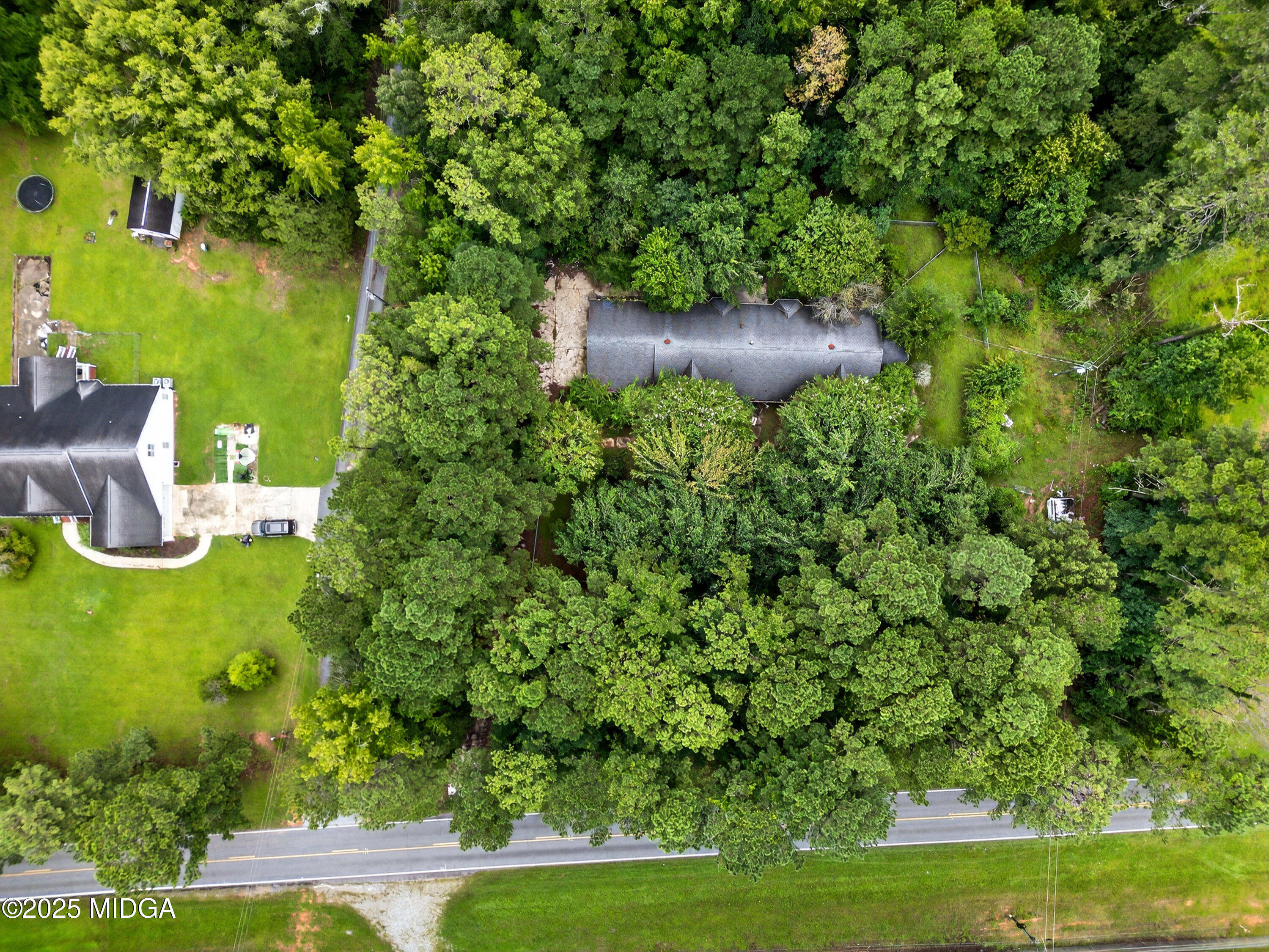 615 Lite-N-Tie Road Gray, GA 31032 - Photo 10 of 19 a view of a garden with a lake view