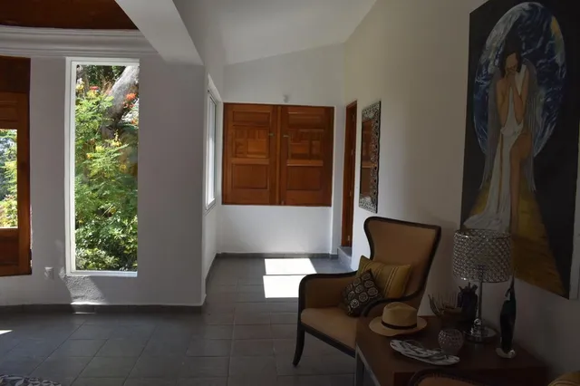 a workspace with furniture and a window