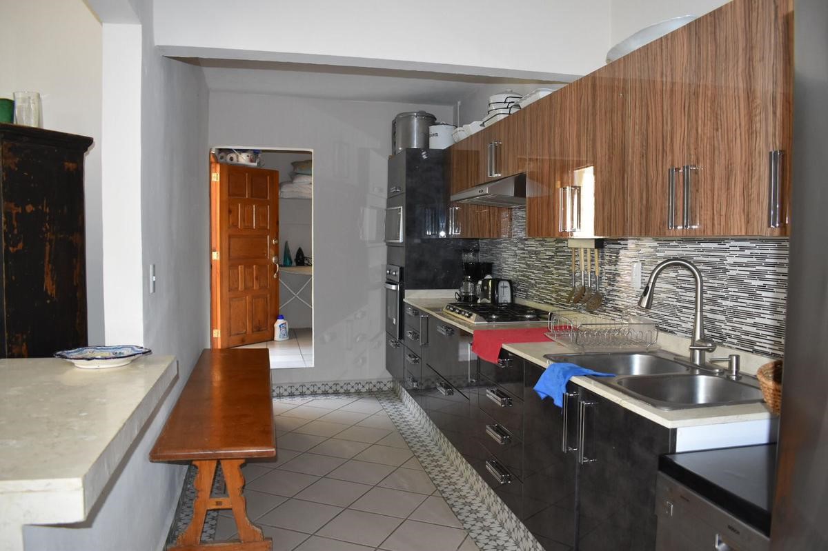 23 Privada Vergel Hillview, IL 62050 - Photo 17 of 17 a kitchen with kitchen island granite countertop a sink a stove and a refrigerator