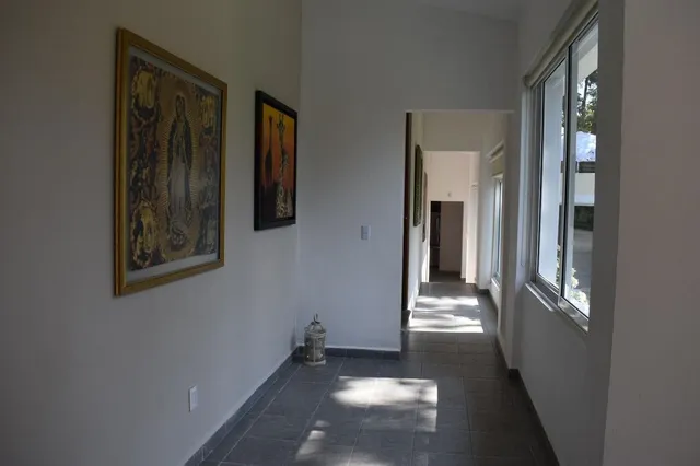 a view of a hallway with an entryway