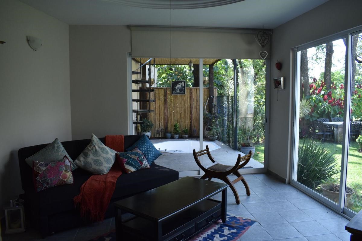 23 Privada Vergel Hillview, IL 62050 - Photo 9 of 17 a living room with furniture and a large window