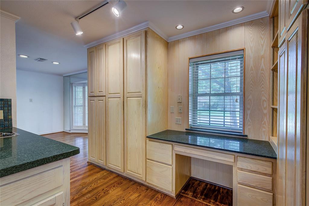 18 Mullaney Road Greenville, TX 75402 - Photo 17 of 37 a kitchen with stainless steel appliances granite countertop a refrigerator and a sink
