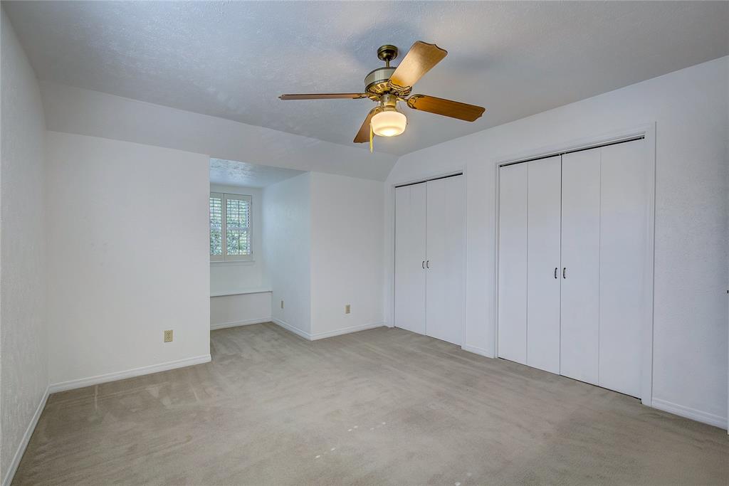 18 Mullaney Road Greenville, TX 75402 - Photo 23 of 37 a view of an empty room and chandelier fan