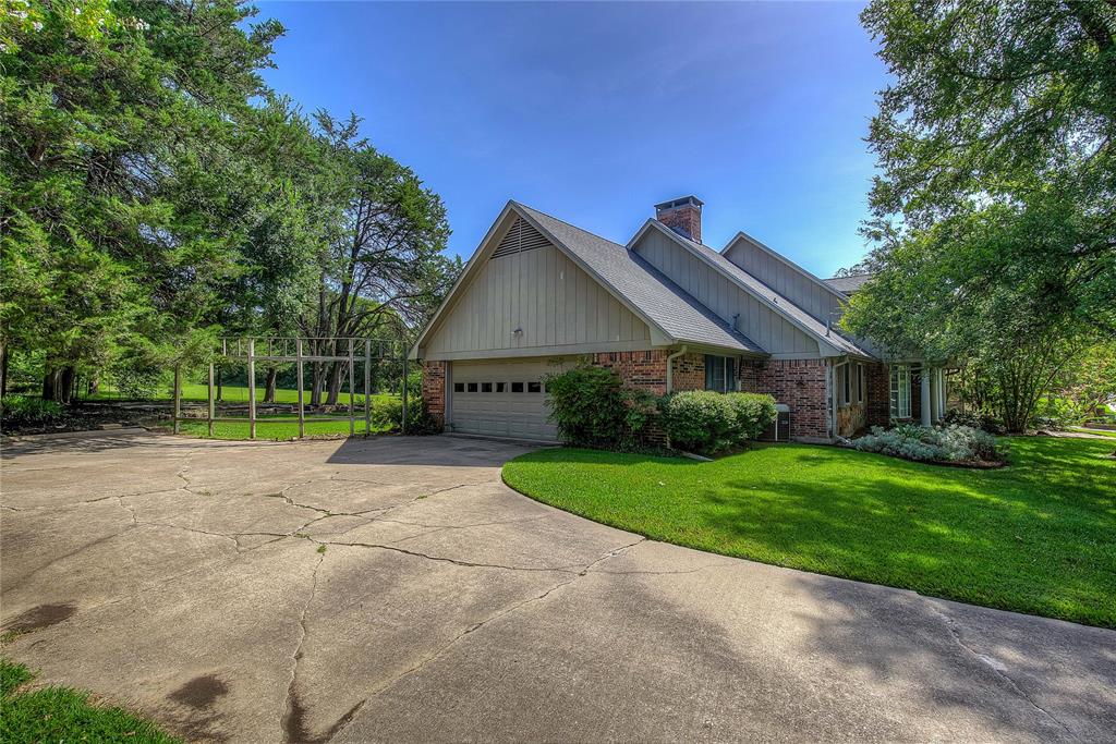 18 Mullaney Road Greenville, TX 75402 - Photo 29 of 37 a view of a house with a yard