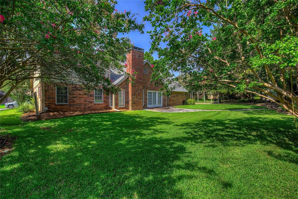 18 Mullaney Road Greenville, TX 75402 - Photo 31 of 37 a view of a house with a backyard