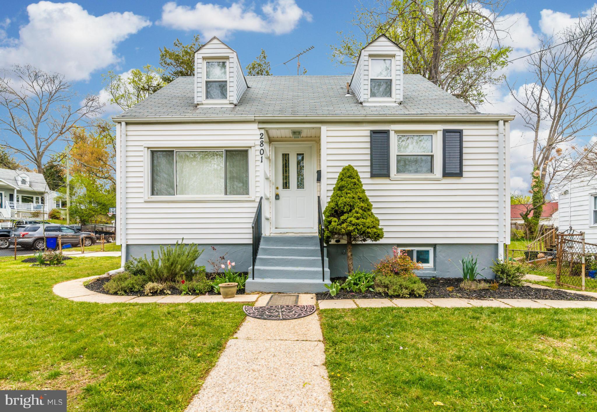 2801 Weisman Road Silver Spring, MD 20902 - Photo 1 of 30 a front view of a house with a yard
