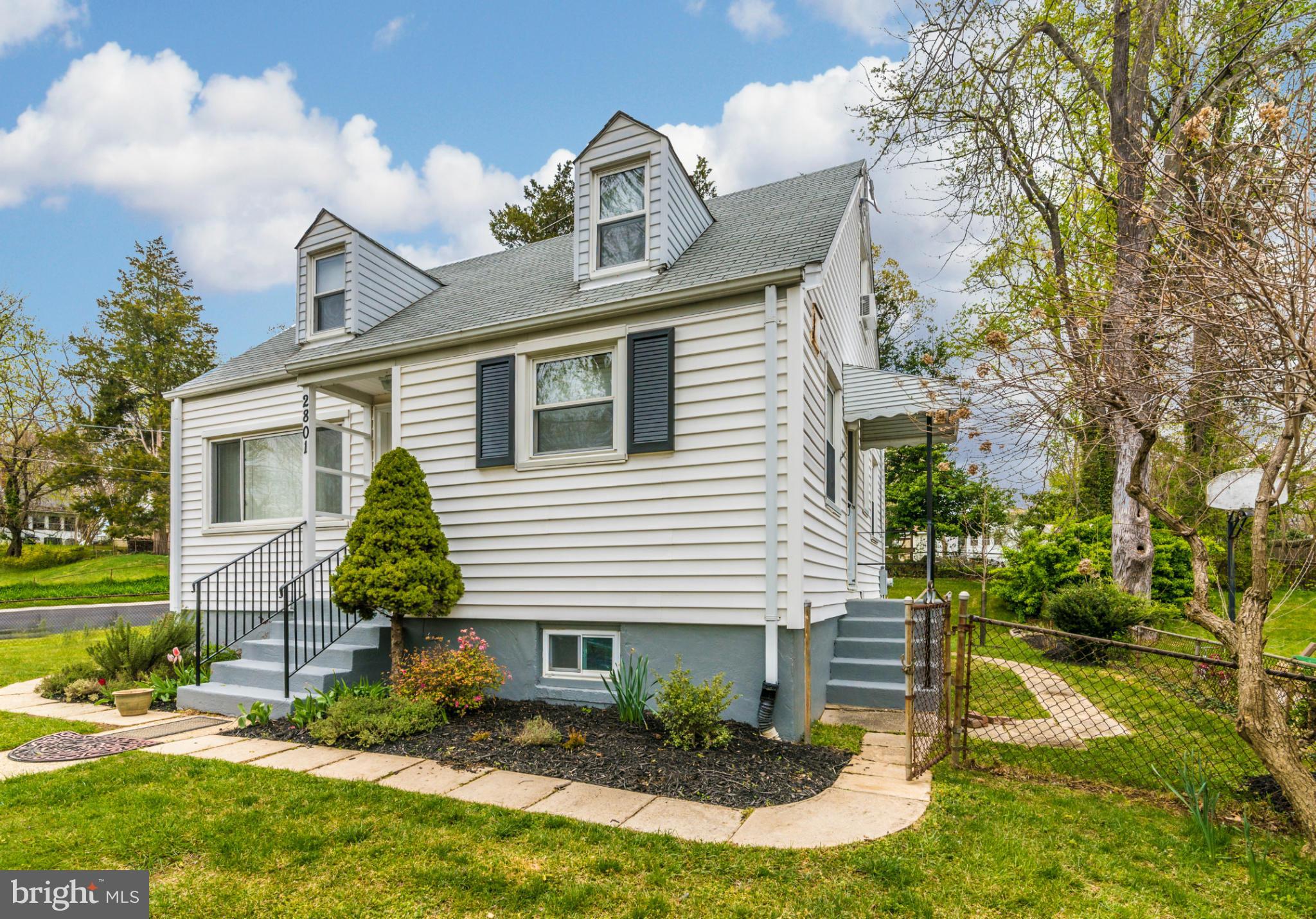 2801 Weisman Road Silver Spring, MD 20902 - Photo 26 of 30 a front view of a house with a yard