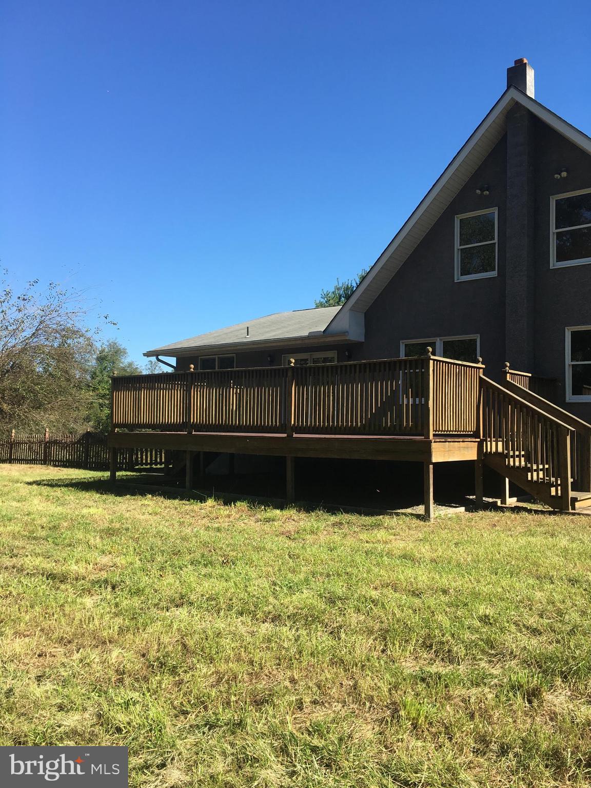 561 Mullica Hill Road Glassboro, NJ 08028 - Photo 20 of 20 a front view of a house with a yard