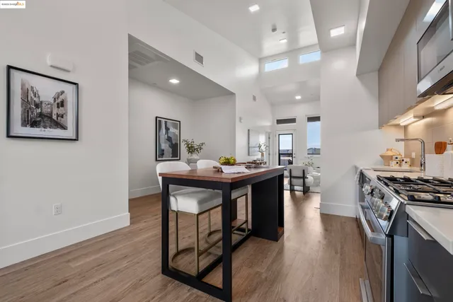 a kitchen with a table and chairs in it