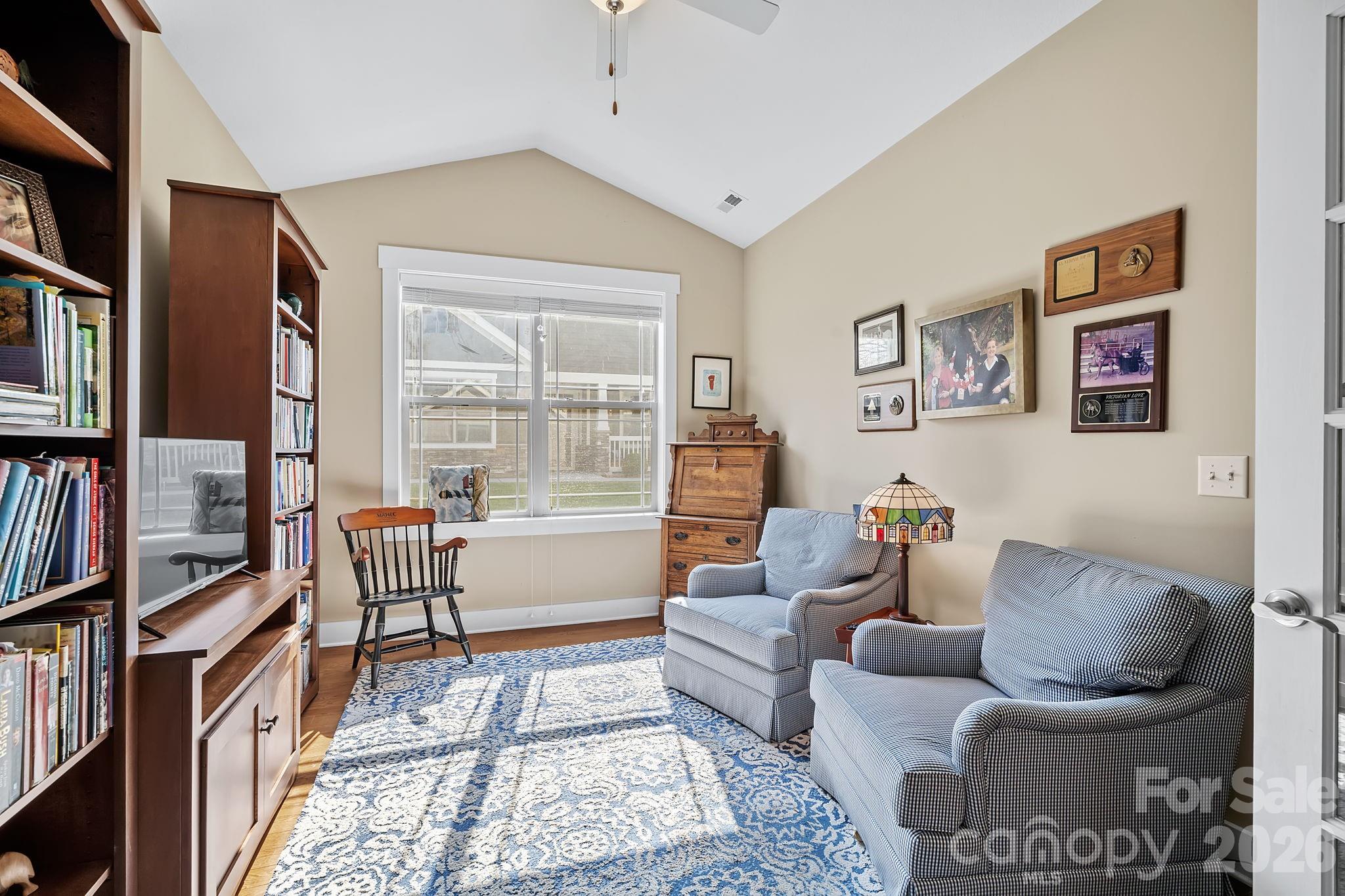 9 Brookstone Place Candler, NC 28715 - Photo 18 of 36 a living room with furniture and a window