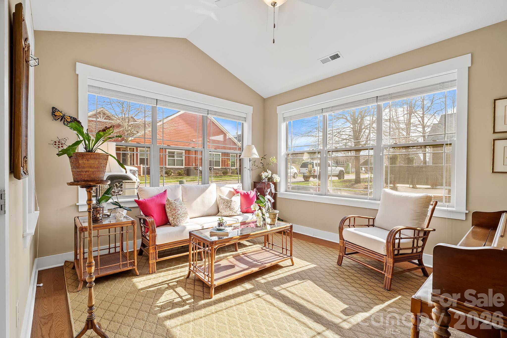 9 Brookstone Place Candler, NC 28715 - Photo 21 of 36 a living room with patio furniture and a floor to ceiling window