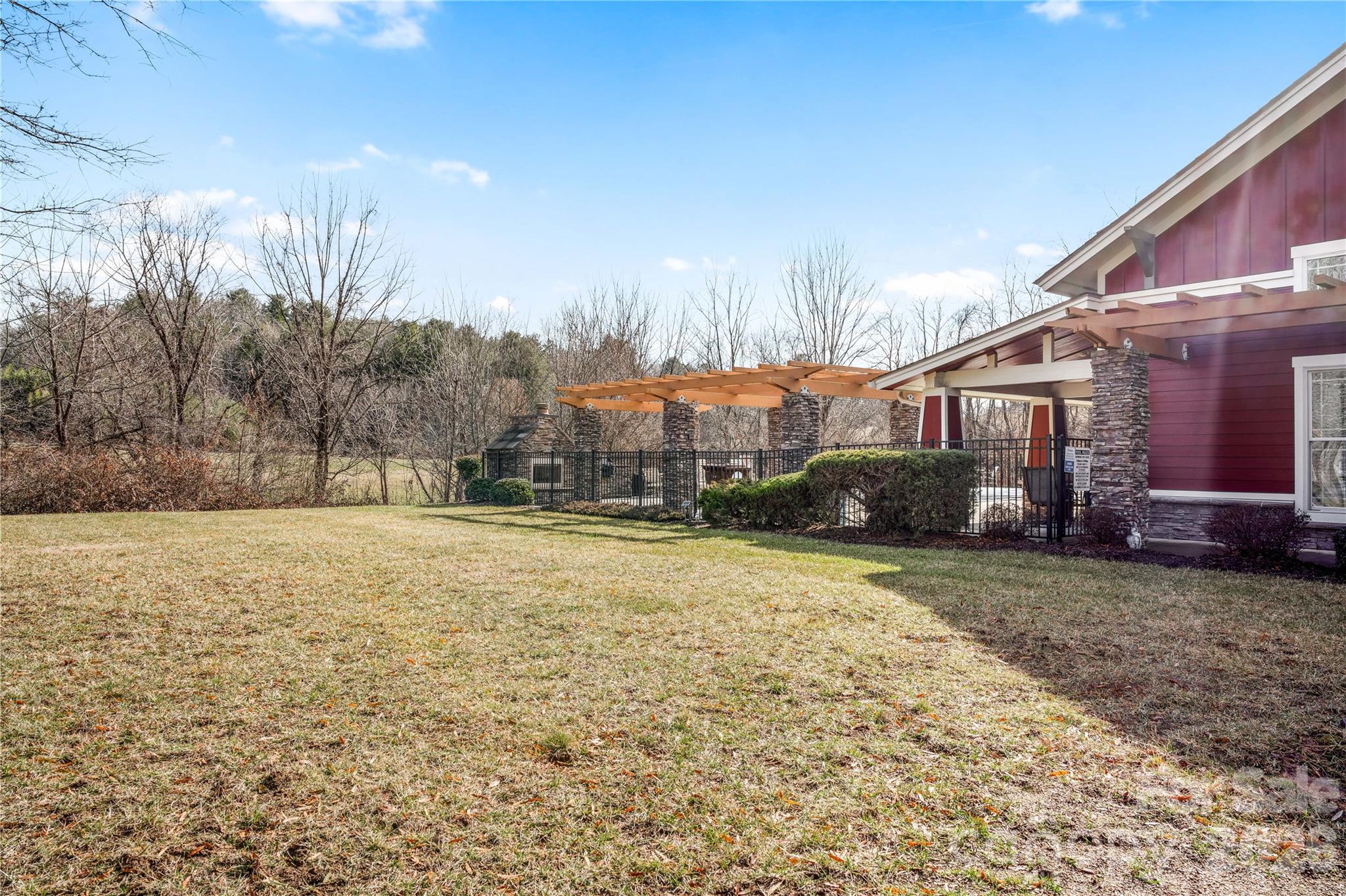 9 Brookstone Place Candler, NC 28715 - Photo 30 of 36 a view of a house with a yard