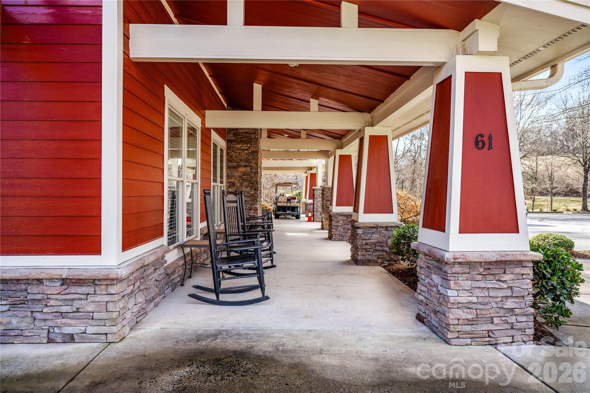 9 Brookstone Place Candler, NC 28715 - Photo 32 of 36 a building outdoor space with patio furniture