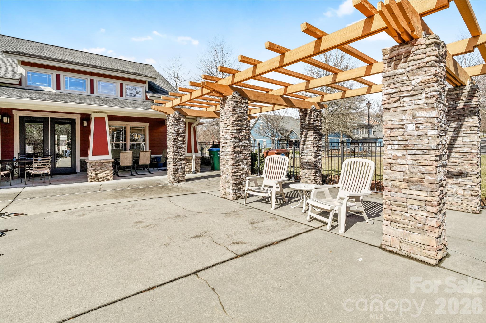 9 Brookstone Place Candler, NC 28715 - Photo 33 of 36 a view of a patio with a dining table and chairs