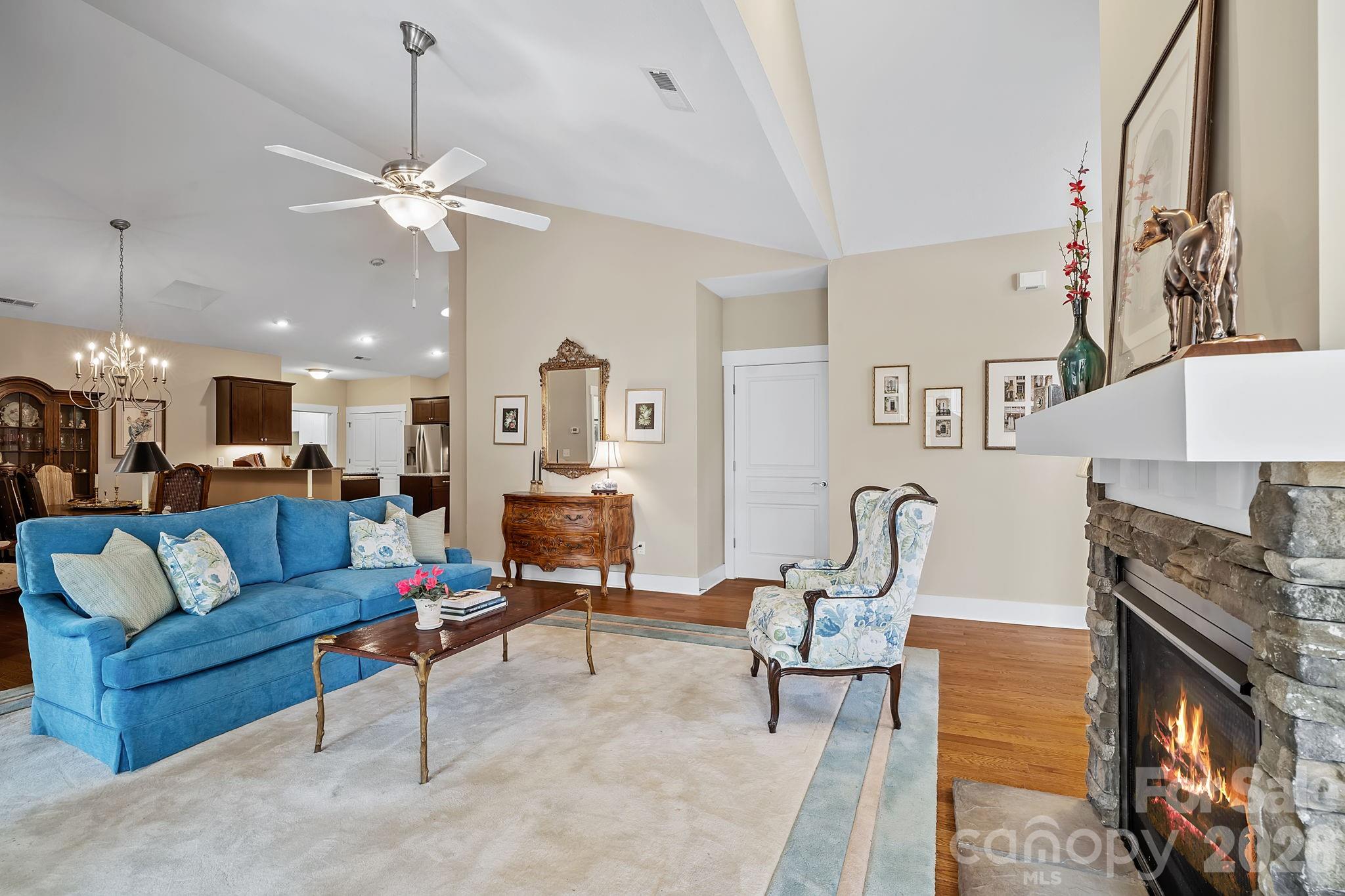 9 Brookstone Place Candler, NC 28715 - Photo 6 of 36 a living room with furniture and a fireplace