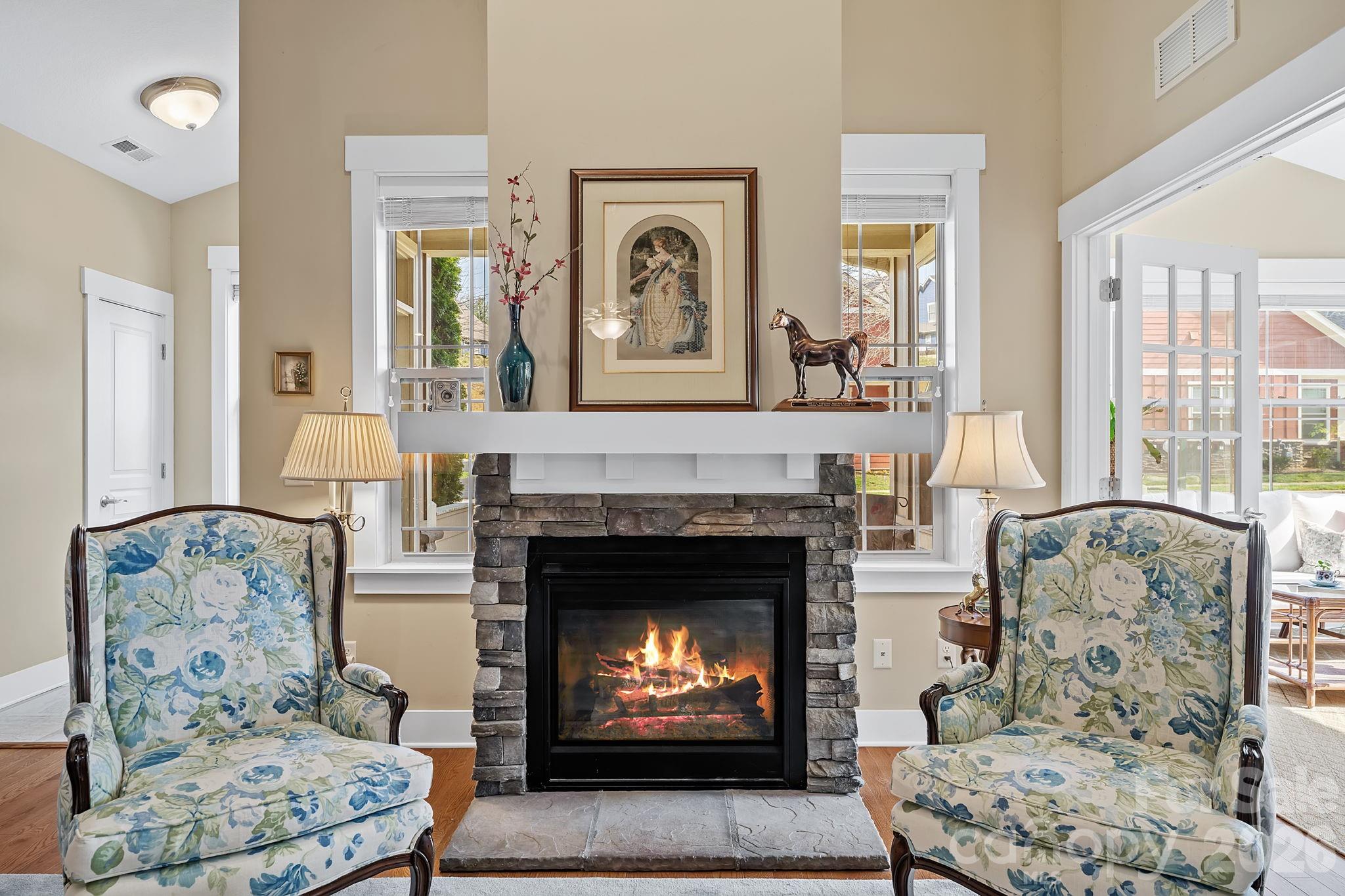 9 Brookstone Place Candler, NC 28715 - Photo 7 of 36 a living room with furniture and a fireplace