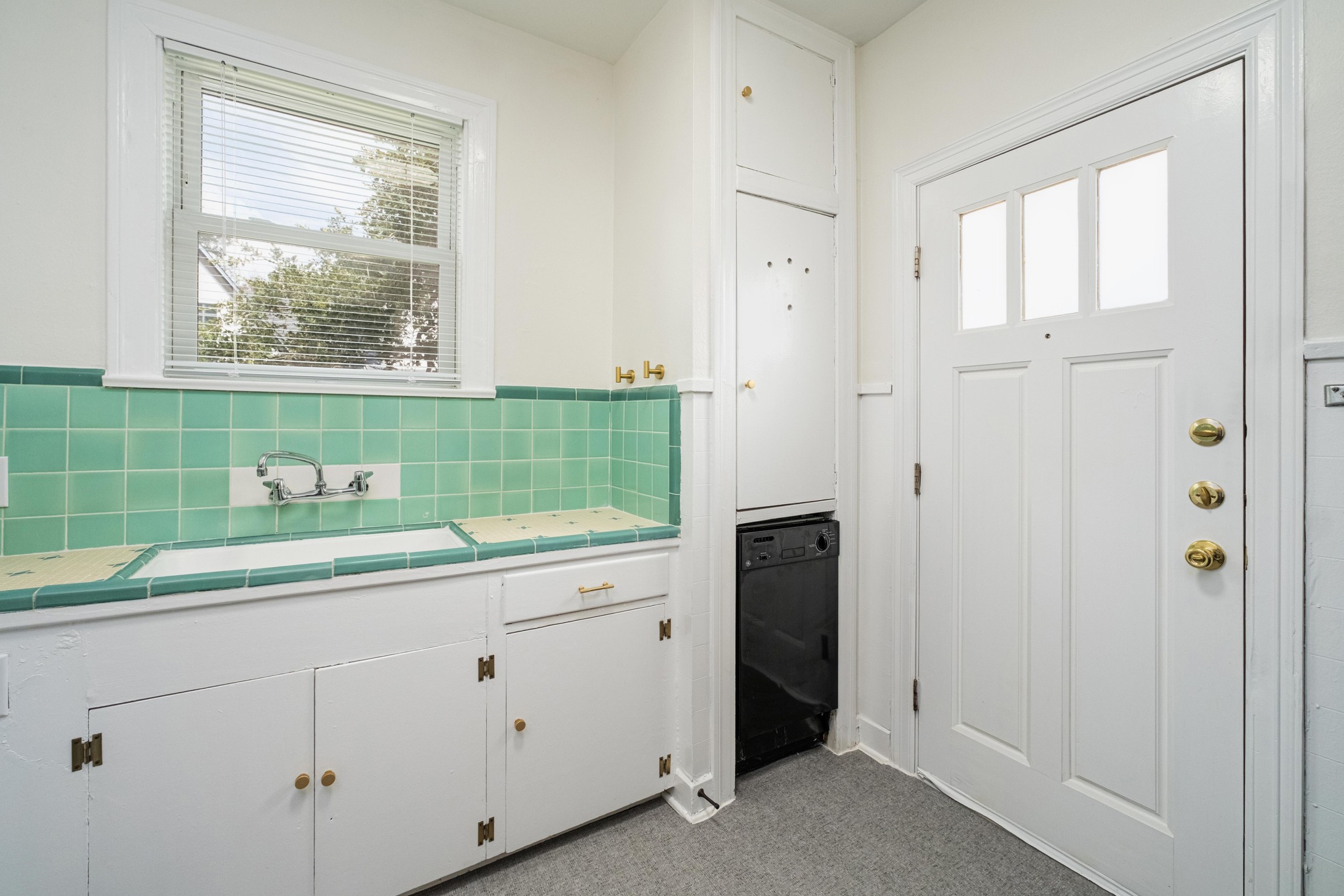 2012 Enfield Road, Unit B Austin, TX 78703 - Photo 7 of 20 A well-equipped utility room provides a functional space for everyday tasks.
