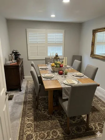 a view of a dining room with furniture