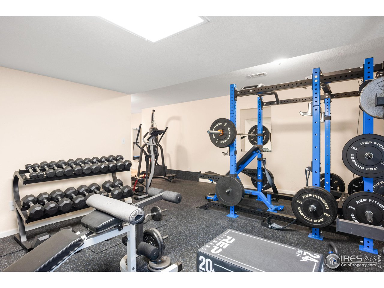5861 Mountain Shadows Boulevard Firestone, CO 80504 - Photo 32 of 39 a view of a room with gym equipment