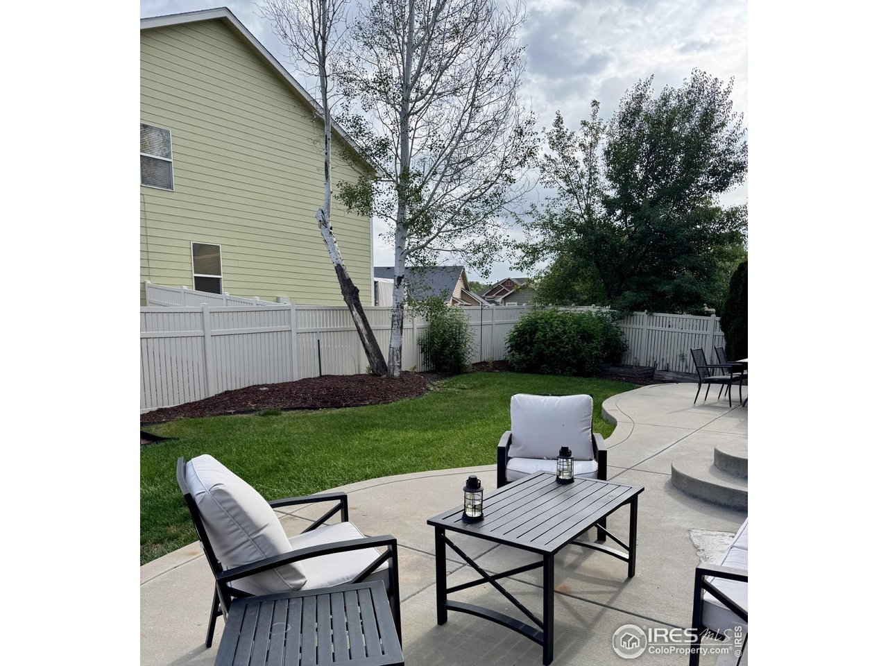 5861 Mountain Shadows Boulevard Firestone, CO 80504 - Photo 38 of 39 a view of a backyard with furniture