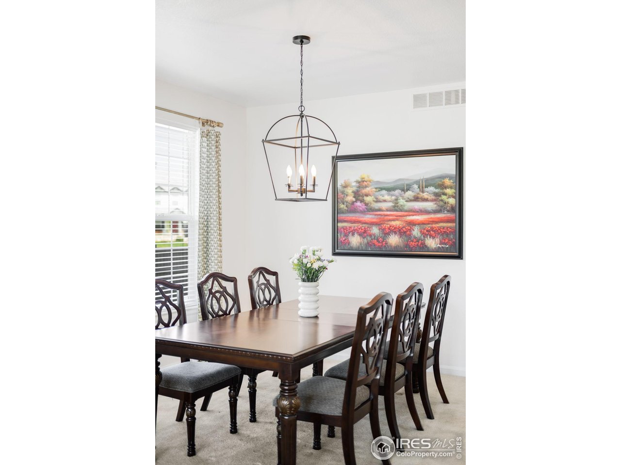 5861 Mountain Shadows Boulevard Firestone, CO 80504 - Photo 5 of 39 a view of a dining room with furniture