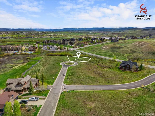 a view of a lake with a yard