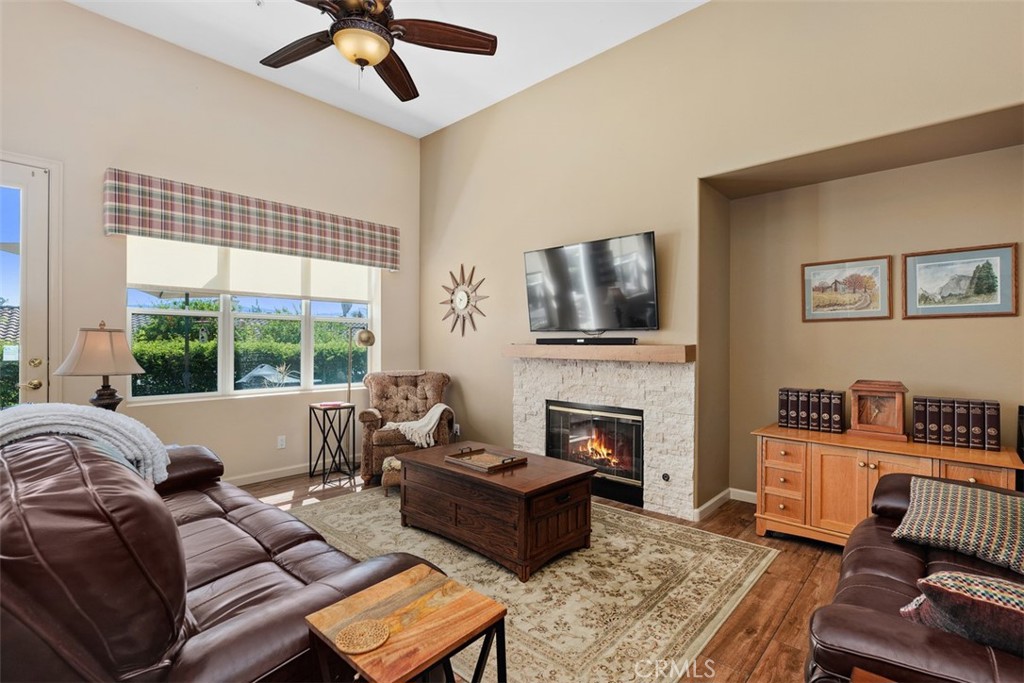 1957 Cresthaven Drive Vista, CA 92084 - Photo 13 of 47 a living room with furniture fireplace and a flat screen tv