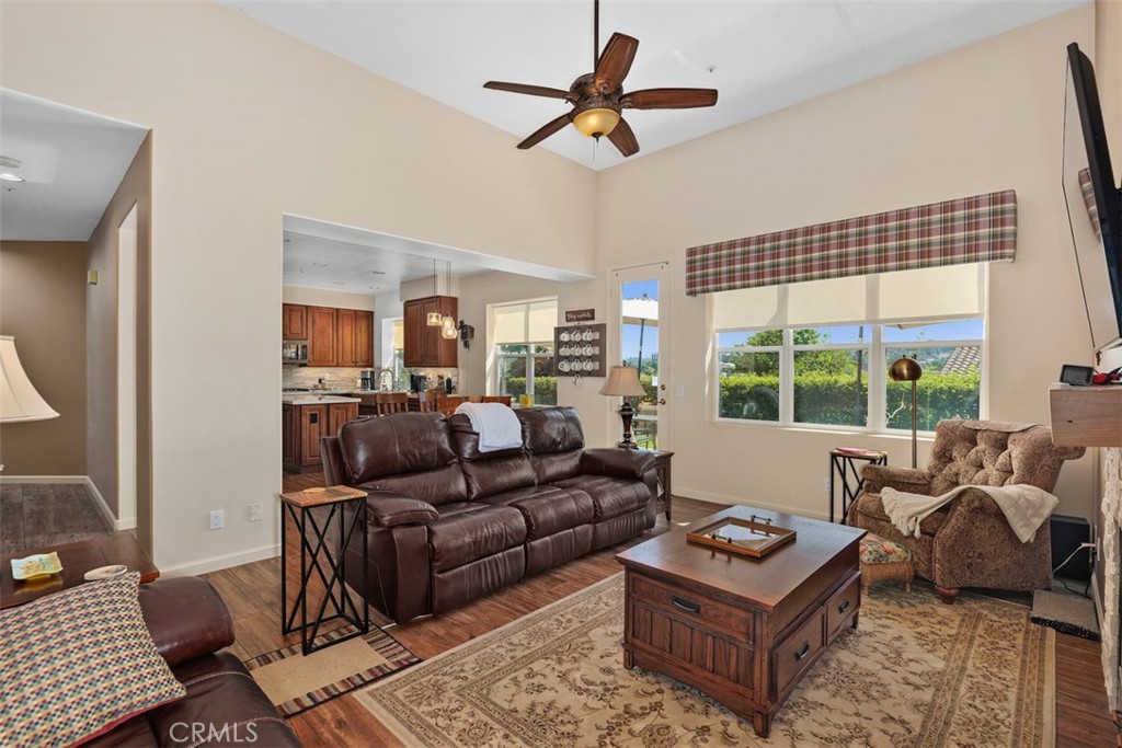 1957 Cresthaven Drive Vista, CA 92084 - Photo 14 of 47 a living room with furniture ceiling fan and a window