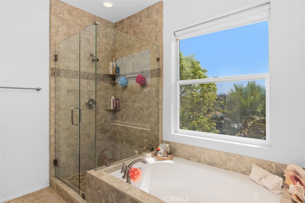 1957 Cresthaven Drive Vista, CA 92084 - Photo 21 of 47 a bathroom with a granite countertop sink and a bathtub