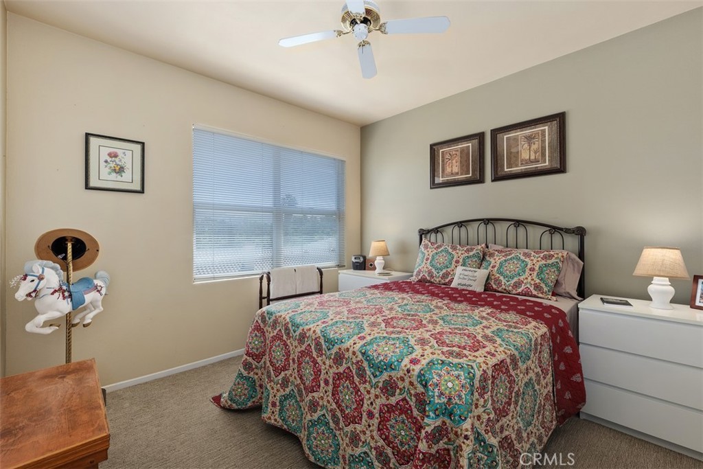 1957 Cresthaven Drive Vista, CA 92084 - Photo 23 of 47 a bedroom with a bed and a window