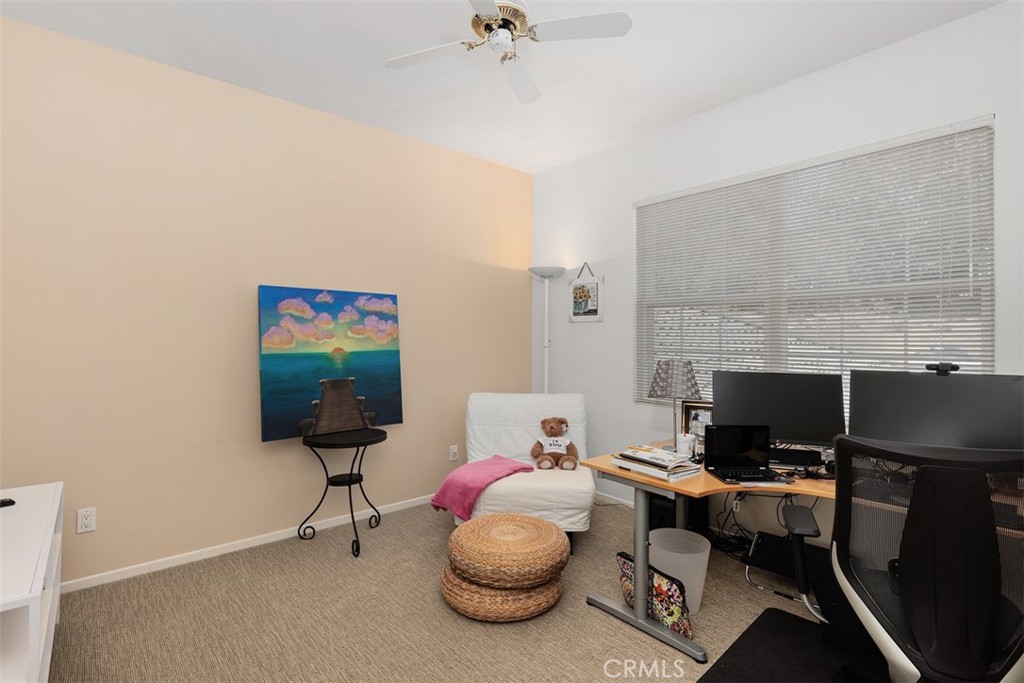 1957 Cresthaven Drive Vista, CA 92084 - Photo 26 of 47 a bedroom with furniture and a fireplace