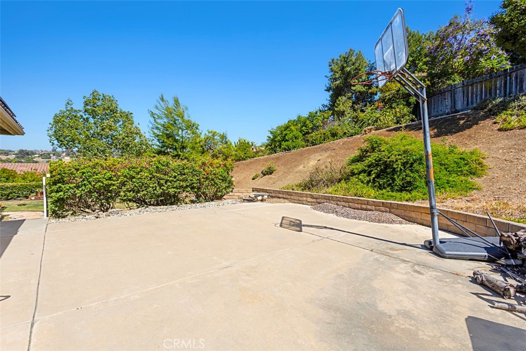 1957 Cresthaven Drive Vista, CA 92084 - Photo 35 of 47 a view of a bath tub and trees in the background