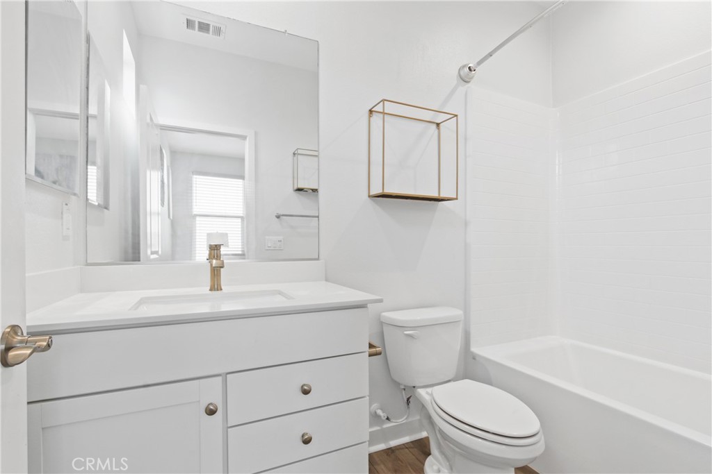 660 Daniel Freeman Circle Inglewood, CA 90301 - Photo 16 of 25 a bathroom with a sink a toilet and shower