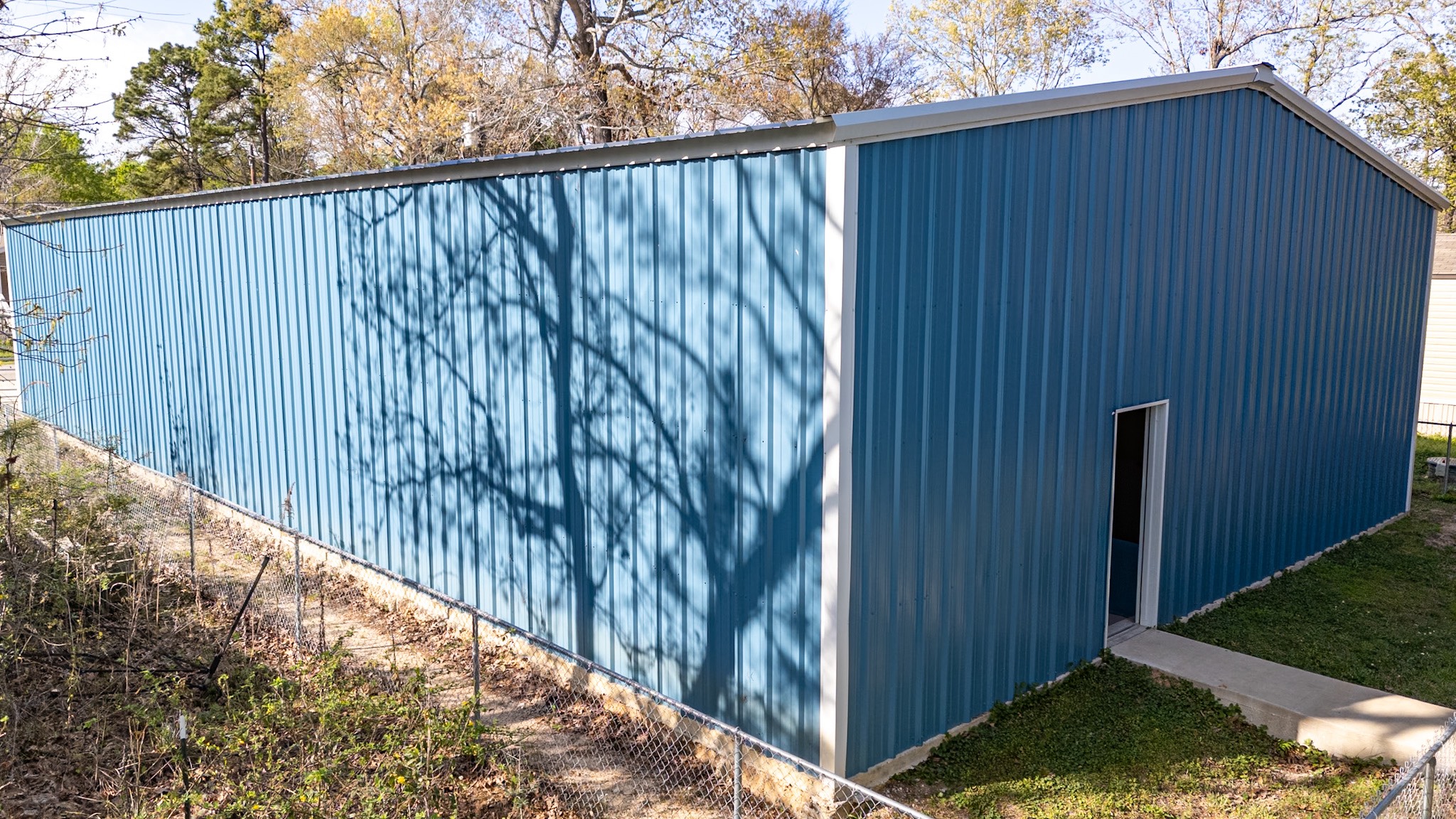 381 Antigua Drive Point Blank, TX 77364 - Photo 9 of 14 a view of outdoor space with wooden fence