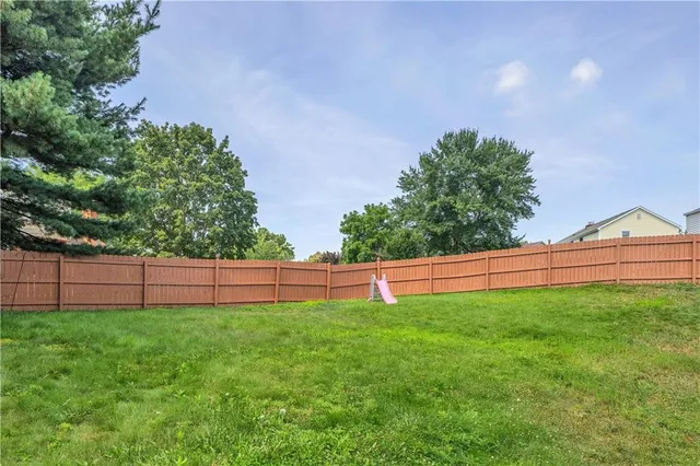 a view of a backyard with plants