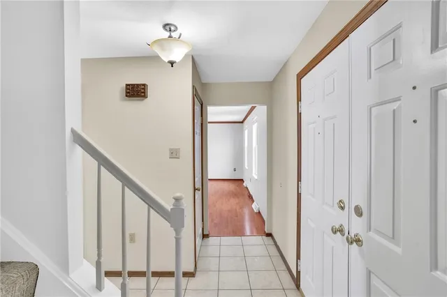 a view of a hallway with closet