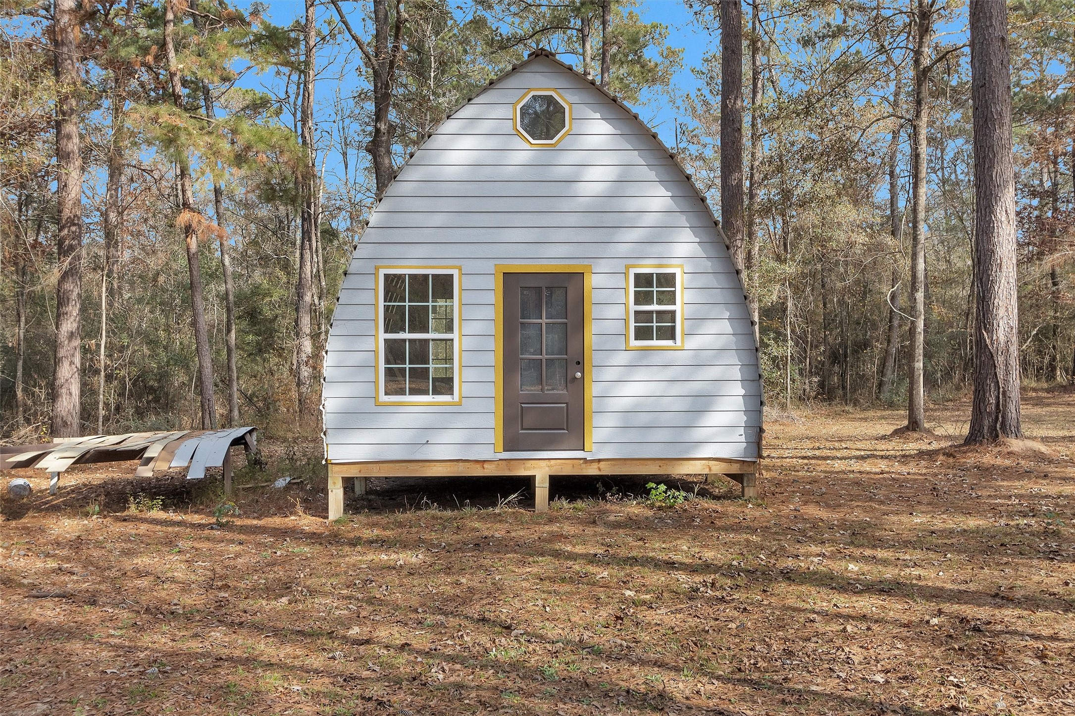 215 Fm 2929 Road Huntsville, TX 77340 - Photo 39 of 50 a front view of a house with garden