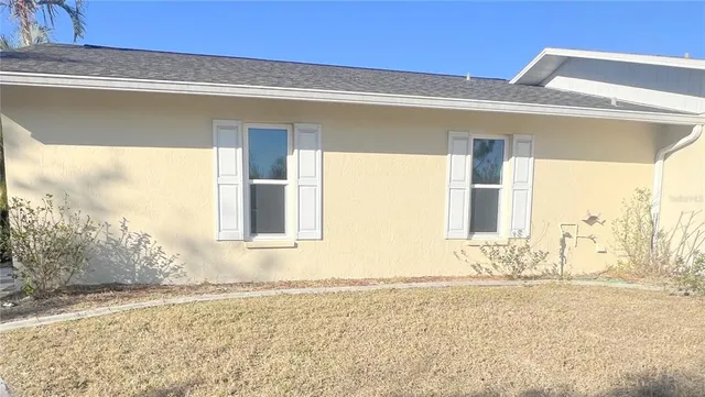 a view of bathroom with a shower and a sink