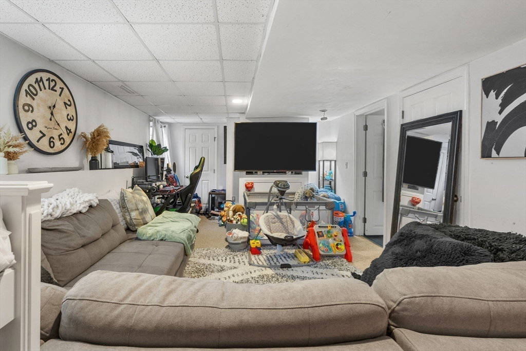 4 Mather Drive Wareham, MA 02571 - Photo 19 of 31 a living room with furniture and a flat screen tv