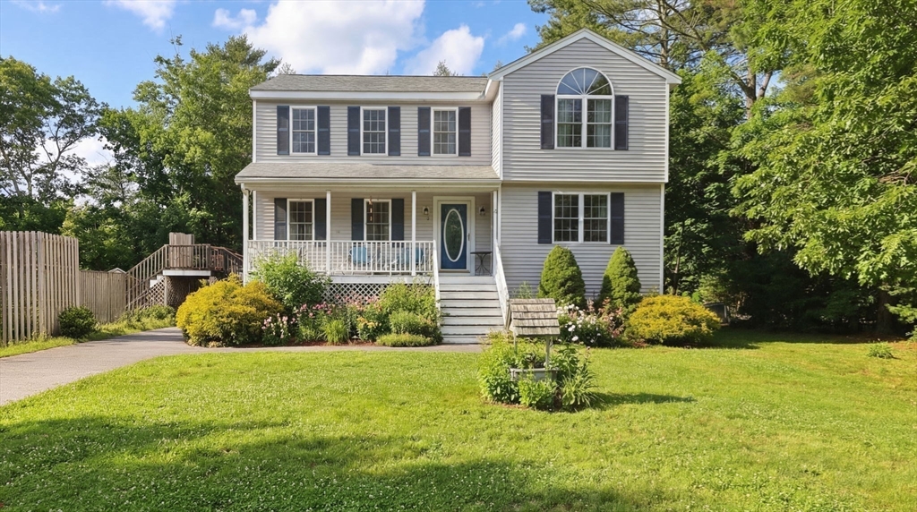 4 Mather Drive Wareham, MA 02571 - Photo 2 of 31 a front view of a house with a yard