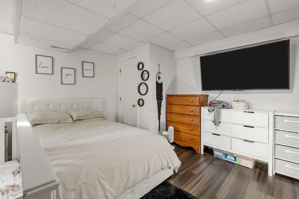 4 Mather Drive Wareham, MA 02571 - Photo 22 of 31 a bedroom with a bed and flat screen tv