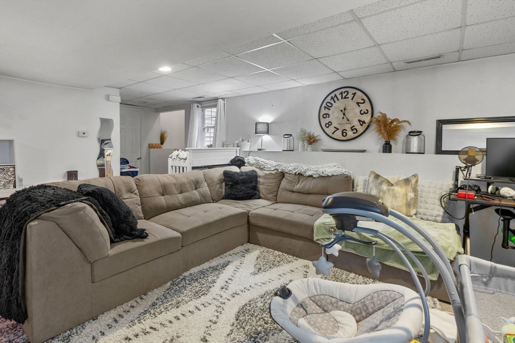 4 Mather Drive Wareham, MA 02571 - Photo 23 of 31 a living room with furniture and a table