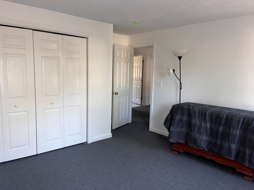 4 Mather Drive Wareham, MA 02571 - Photo 30 of 31 a bedroom with a bed and a window