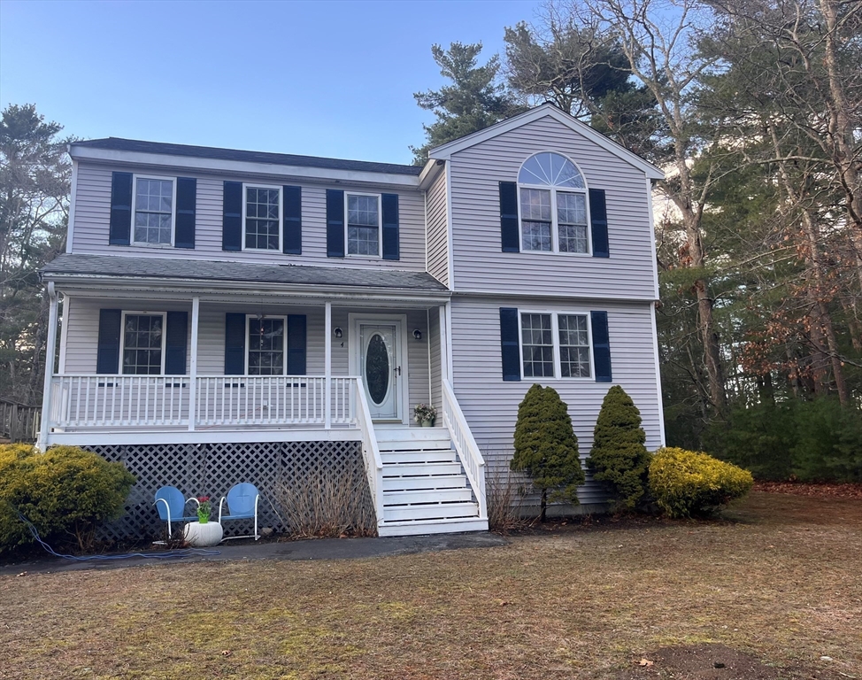 4 Mather Drive Wareham, MA 02571 - Photo 3 of 31 a front view of a house with garden