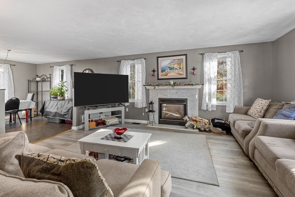 4 Mather Drive Wareham, MA 02571 - Photo 6 of 31 a living room with furniture and a flat screen tv