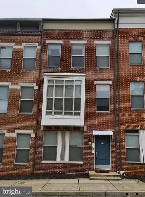 10 South Exeter Street Baltimore, MD 21202 - Photo 1 of 8 Charming brick facade with modern flair.