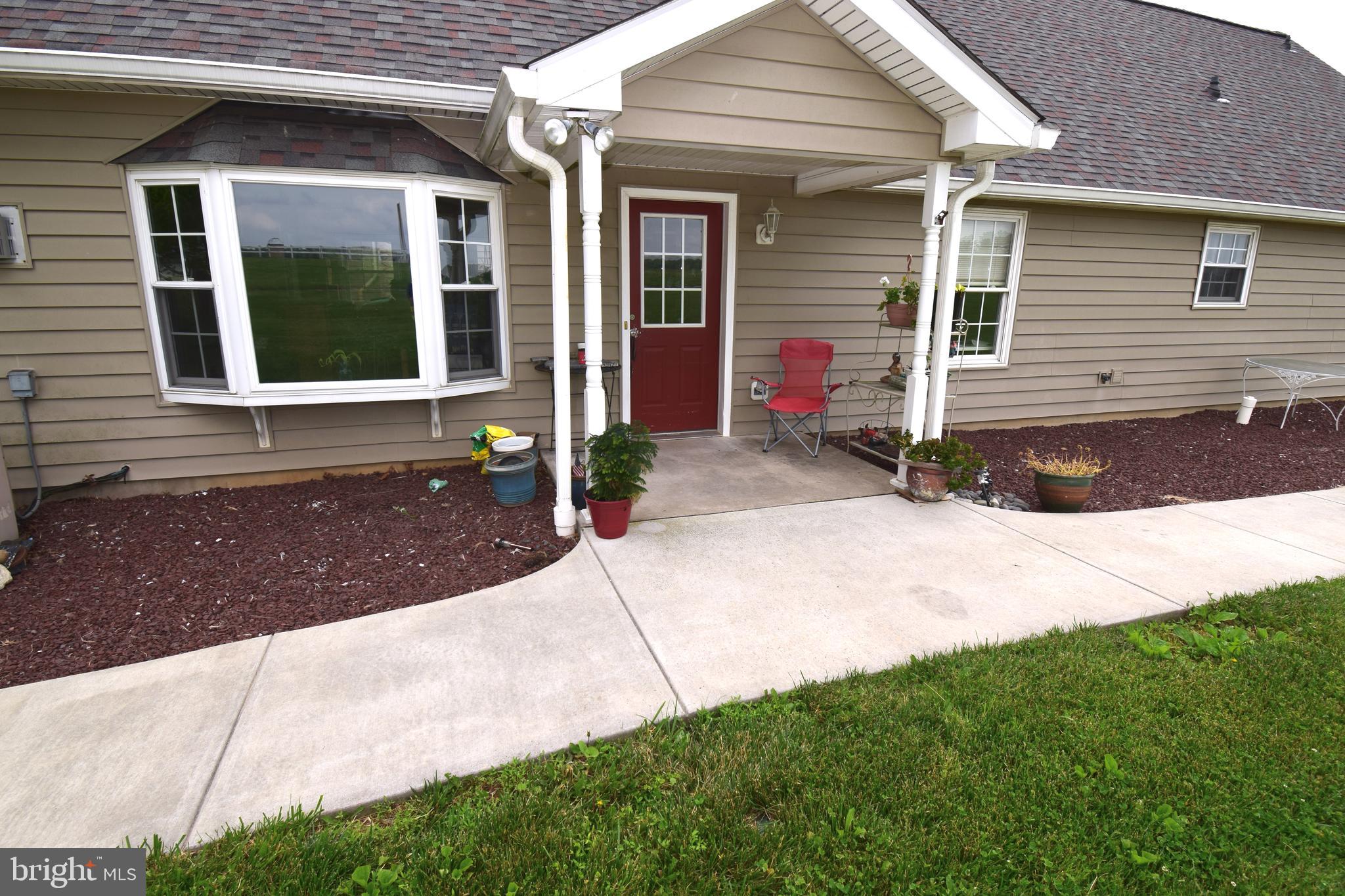 3875 Bark Hill Road Union Bridge, MD 21791 - Photo 111 of 142 a front view of a house with garden