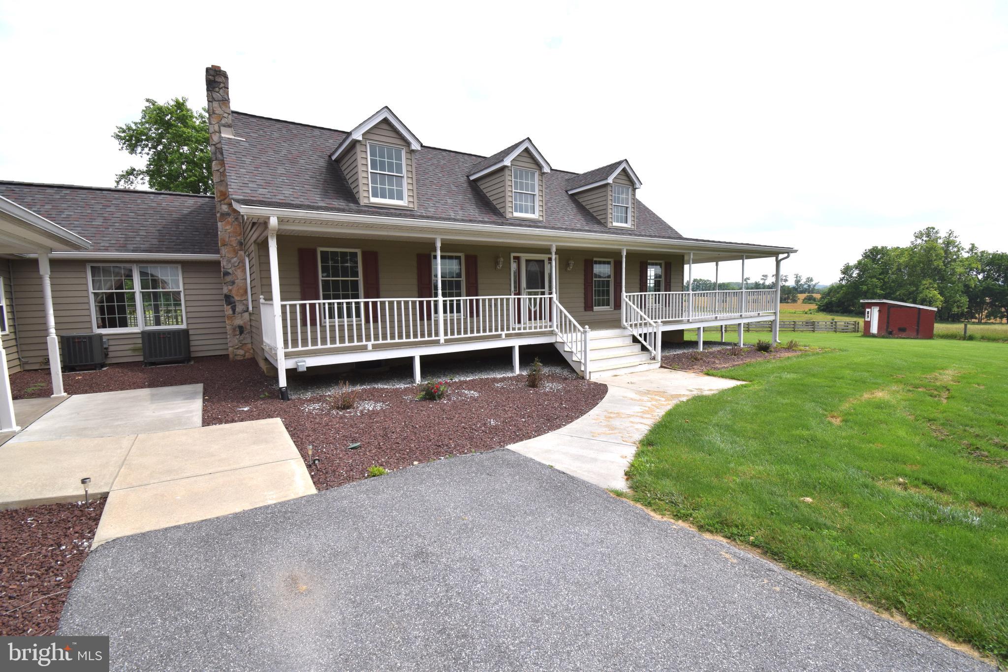 3875 Bark Hill Road Union Bridge, MD 21791 - Photo 132 of 142 a front view of a house with a yard